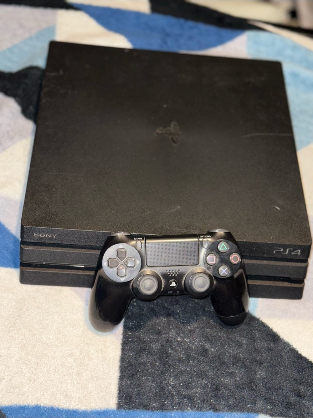 Sony PS4 Slim Console with Black DualShock 4 Controller